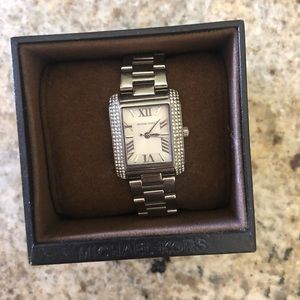 NEVER WORN: silver Micheal Khors watch